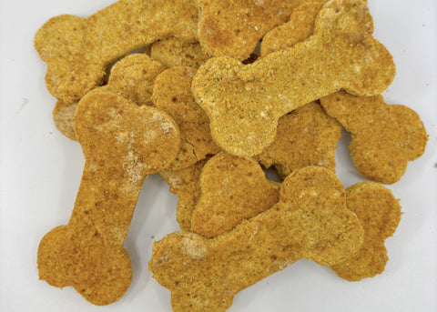 Grain-free dog treats on neutral background