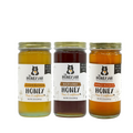 Three jars of honey from The Honey Jar on a white background