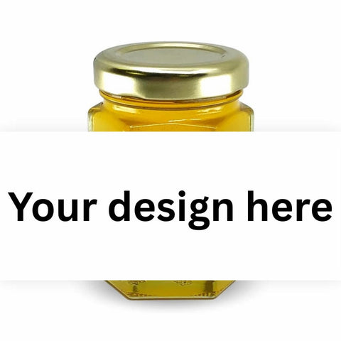 Jar of honey with white label showing 'your design here' wording.