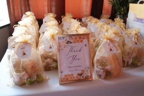 Gift bags with 'Thank You' sign on a table