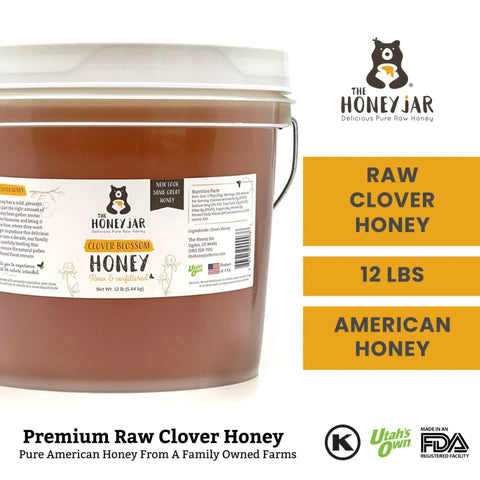 Honey jar with label and 'The Honey Jar' branding on a white background