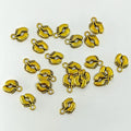 Gold colored baby feet charms are scattered across the image.