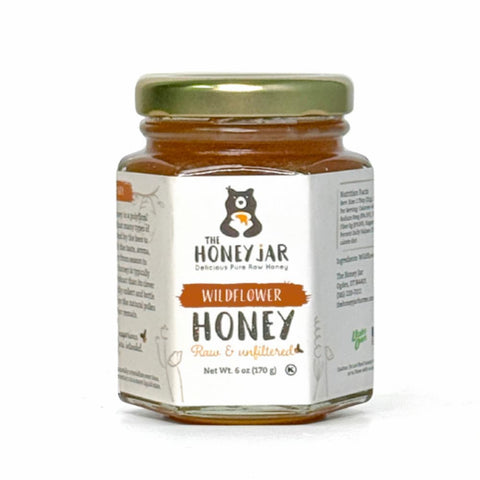 Jar of wildflower honey from The Honey Jar on a white background