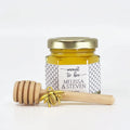 set options shown include honey, 2 oz hexagon jar, gold lid, 3" wooden honey dipper, gold bee charm, and personalized label with honeycomb theme. Title on label is Meant to Bee.